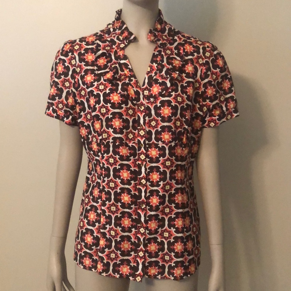 Harold’s orange and brown blouse
